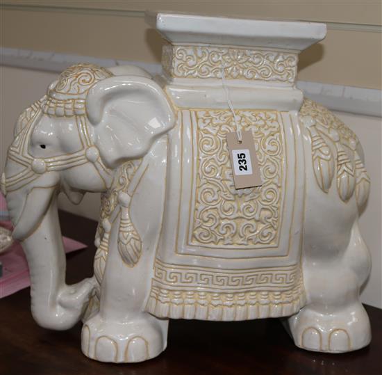 A modern cream-glazed pottery elephant seat